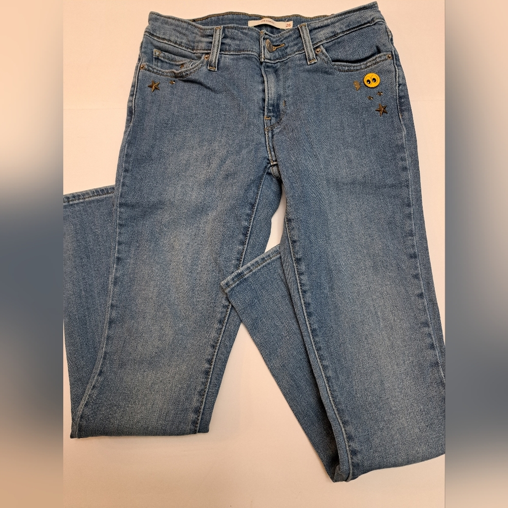 Levi's unique 711 skinny jeans with emoji & star studs. Size 26. A-3.